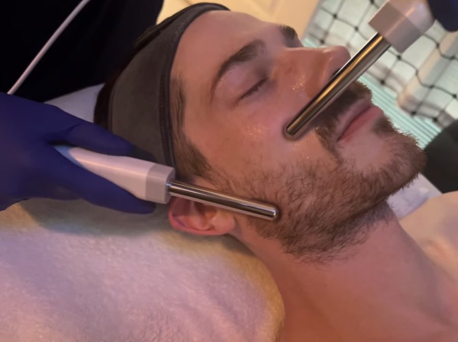 AZS Microcurrent facial dual probe treatment for muscle toning and lifting on male client at Awaken Zen Spa in Mesa, AZ