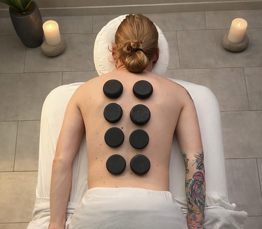 Warm Stone Retreat hot stone massage with basalt stones at Awaken Zen Spa in Mesa, AZ